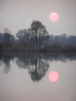 Sunset is reflected on the water. 