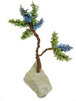 Tree on the stone, interlaced from the beads