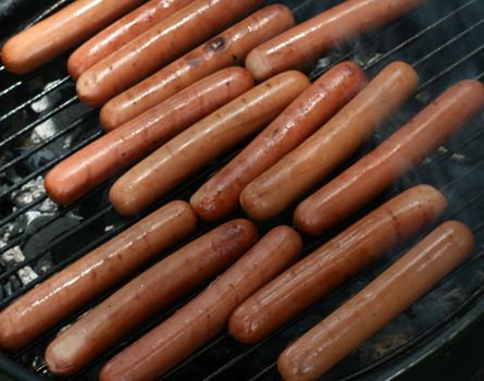 Hot dogs on grill