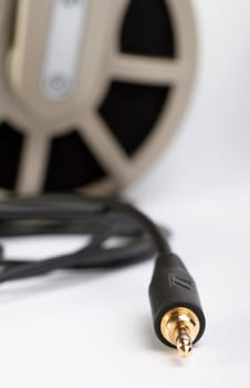 A closeup shot of a plug of a headphone