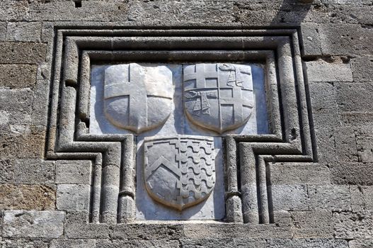 Detail of medieval shield, Rhodes fortress, Greece.