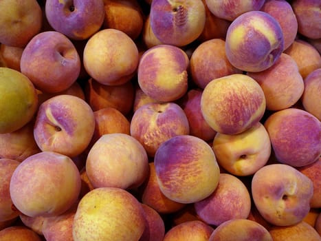 Background of whole, ripe, peaches