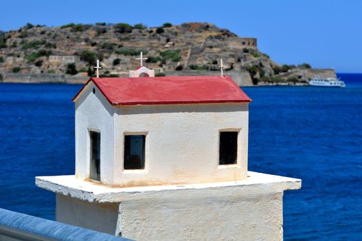 Greek tradition: Miniature Greek Ortodhox church, indicating a fatal road 

accident site.