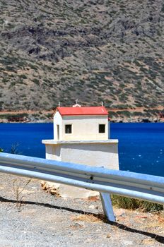 Greek tradition: Miniature Greek Ortodhox church, indicating a fatal road 

accident site.