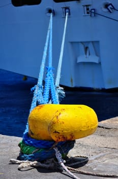 Ship tied to mooring cleat