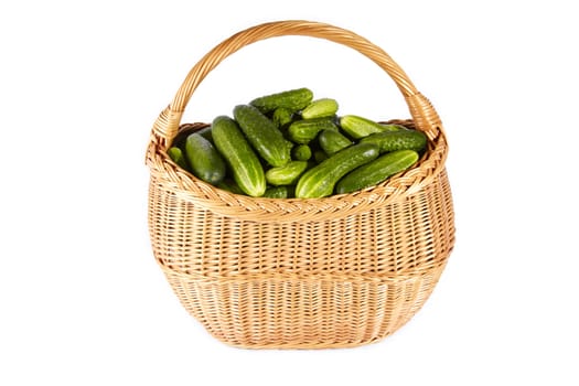 Cucumber on basket isolated on white background