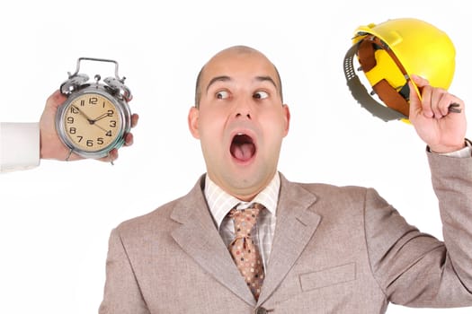 confused a businessman looking at clock alarm