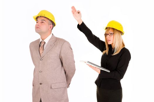 businesswoman and architect looking up on white background