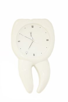 a clock like a tooth