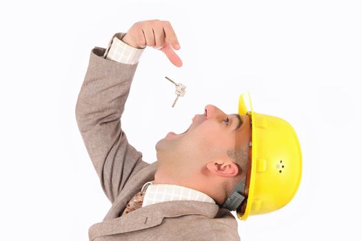 A businessman engulf keys on white background