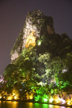 Night image of Dai Cai Hill (Folded Brocade Hill), Guilin, Guangxi Zhuang Autonomous Region, China.