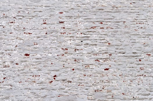 Fragment of rustic white brick wall surface