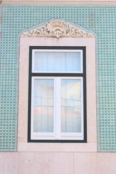Old window of traditional fisherman houses of Lisbon, Portugal