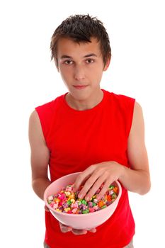 A boy with colourful tasty popcorn in a large bowl.  White background.