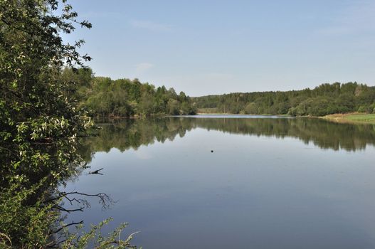 View of lake with reflections in water