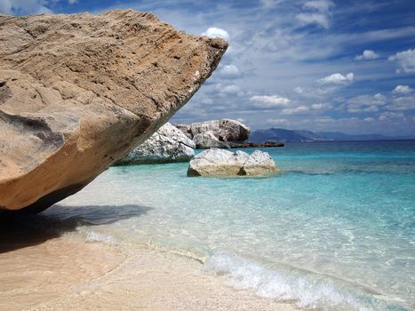 Big rocks and emerald water at Cala Mariolu, a beach in the �Golfo di Orosei�, Sardinia, Italy.