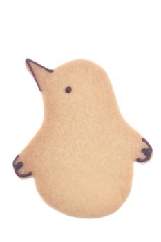 Isolated image of a penguin shaped biscuit.