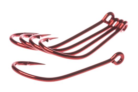 Isolated macro image of red fish hooks.