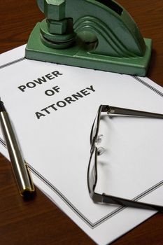 Image of a power of attorney on an office table.
