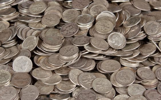 Stack of pure silver coins - US 10c dime pieces