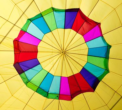 Center of a colorful hot air balloon being inflated