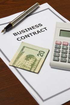 Image of a business contract on an office table.