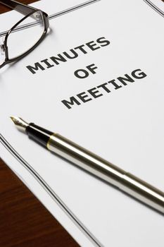 Image of a minutes of meeting on an office table.