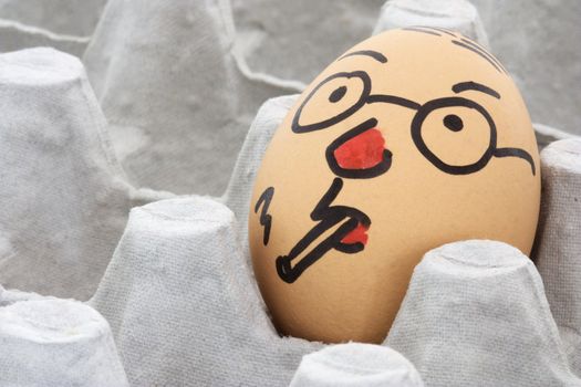 Image of a face painted egg.