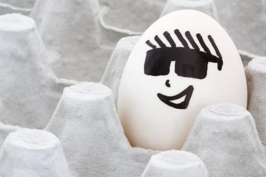 Image of a face painted egg.