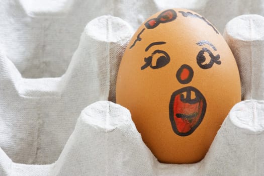 Image of a face painted egg.