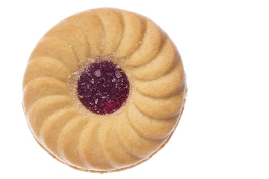 Isolated macro image of a jam biscuit.