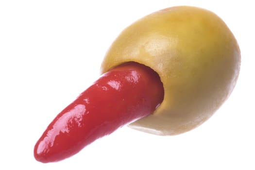 Isolated macro image of a pickled pepper olive.