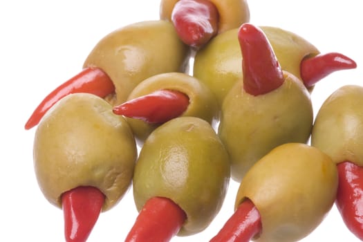 Isolated macro image of pickled pepper olives.