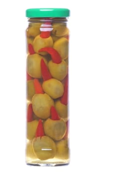 Isolated macro image of pickled pepper olives in a bottle.