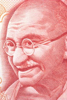 Macro image of Mahatma Gandhi on a currency note.