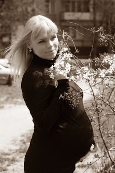 The pregnant woman on the ninth month. The child will be born one of these days