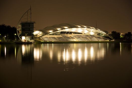 Night image of the lakeside water sports pavillion at Putrajaya, Malaysia.