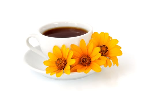 A cup of coffee with yellow flowers on the saucer isolated