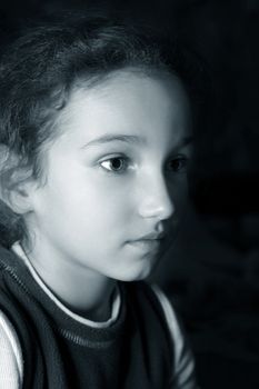 Portrait of the beautiful little girl. B/w + blue tone
