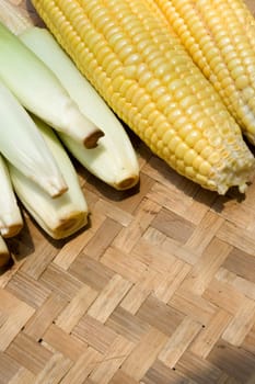 variety of corn on traditional bamboo tray