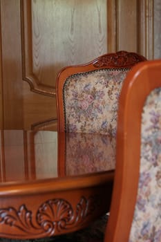 Luxury Wooden Table and Chairs close up.