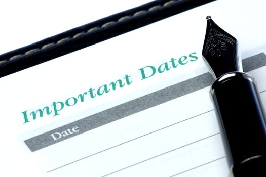 Image of the words "important dates" in a diary.