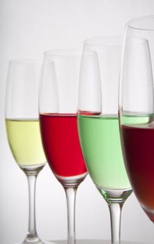 Colorful cocktails for a party or celebration served in a champagne glass