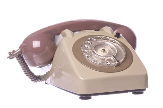Isolated image of a vintage telephone.