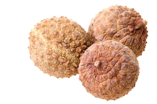 Isolated macro image of dried lychees.