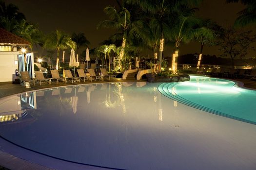 Night image of a swimming pool in Malaysia.