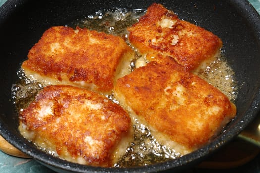 slices of roast fish take photograph close-up                              