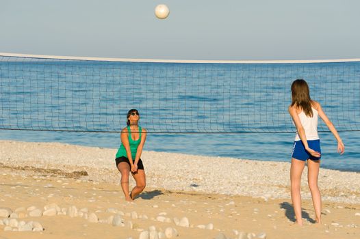 Volleyball match on a sunny Mediterranean beach