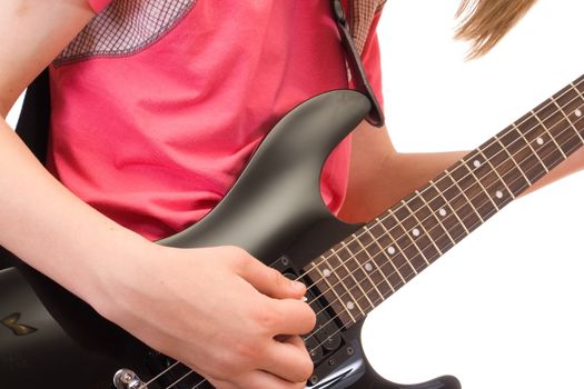 teenager musician plays on guitar