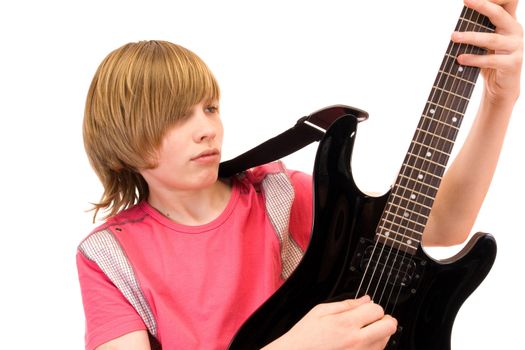 teenager musician plays on guitar